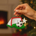 Load image into Gallery viewer, Personalized soccer ornament featuring a detailed goal and ball design with a glossy finish and raised 3D details. The ornament includes one custom name and year displayed on the front. Styled with festive lighting and greenery, this sports themed ornament is perfect for soccer lovers, players, and coaches. Designed with a 3D front and flat back, lightweight and easy to hang on a Christmas tree or display year round.