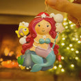 Load image into Gallery viewer, Personalized mermaid Christmas ornament with red curly hair, teal seashell top and purple tail, custom name and year holiday keepsake