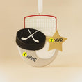Load image into Gallery viewer, Hockey-themed ornament with customizable name and year on a beige background