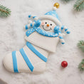 Load image into Gallery viewer, Decorative stocking with a snowman design on a snowy background