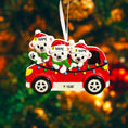 Load image into Gallery viewer, Decorative Christmas ornament with three polar bears in a red car, each wearing a different hat and scarf.
