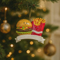 Load image into Gallery viewer, Ornament shaped like a hamburger and fries with a banner on a Christmas tree.