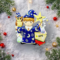 Load image into Gallery viewer, A cute blue-robed wizard boy Christmas ornament featuring a magic wand, star, open book and owl, perfect for kids. Personalized with name and year. Ideal holiday tree decoration for little wizard fans and magical Christmas gifts.