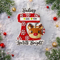 Load image into Gallery viewer, Personalized baking ornament featuring a festive red stand mixer design with snowflake details and a cute reindeer bowl accent. Finished with a smooth glossy surface and holiday inspired colors. Includes free handwritten personalization with one name and year displayed on the mixer. Designed with a raised 3D front and flat back for easy hanging. Styled in a cozy Christmas setting with snow greenery and ornaments, perfect for bakers home cooks and holiday keepsakes.