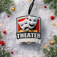 Load image into Gallery viewer, Personalized theater ornament featuring classic comedy and tragedy drama masks on a stage design. Custom name and year handwritten on the front banner. High detail 3D resin ornament with black hanging ribbon. Ideal Christmas tree decoration for theater lovers actors actresses drama students and stage performers. A meaningful keepsake celebrating passion for theater and performing arts.