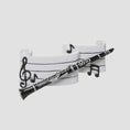Load image into Gallery viewer, Black clarinet hair clip with music notes on a white background
