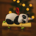 Load image into Gallery viewer, Fully 3D personalized unicorn panda Christmas ornament featuring a sleeping panda resting on a bamboo branch with a pastel unicorn horn. This ornament has a fully sculpted three dimensional front and back with no flat surfaces, creating a playful and premium look. Custom name and year are added by hand. Perfect for kids, panda lovers, unicorn fans, and whimsical holiday decor. A unique 3D keepsake for Christmas trees and seasonal displays.

