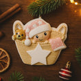 Load image into Gallery viewer, Personalized Baby Girl First Christmas Ornament featuring a detailed 3D front design with a sweet baby resting inside a woven basket, pink nightcap, teddy bear, and hanging star for the year. The baby’s name is added on the hat and the year on the star, creating a meaningful keepsake. Soft pink tones, cozy textures, and dimensional elements make it perfect for newborn girl gifts, baby shower presents, and treasured first Christmas tree memories.
