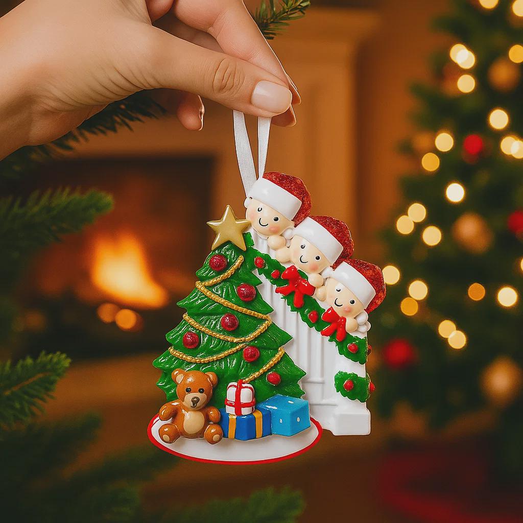 Decorative Christmas ornament with children around a tree, held by a hand with a festive background.