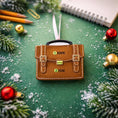 Load image into Gallery viewer, Small brown leather briefcase ornament on a green surface with Christmas decorations
