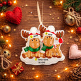 Load image into Gallery viewer, Personalized reindeer couple ornament featuring two festive reindeer with customizable names and a family name or year. Perfect for couples, families, siblings, or loved ones, this ornament symbolizes togetherness, warmth, and holiday joy. A charming keepsake for Christmas trees or seasonal decor, ideal as a thoughtful gift celebrating shared memories and festive traditions.
