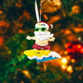 Load image into Gallery viewer, Personalized surfing Santa Christmas ornament featuring a fun beach themed Santa riding a wave on a surfboard. Raised 3D front details add depth while the back remains flat for easy hanging. Custom name and year placement make this ornament a playful and unique holiday keepsake for Christmas tree decor.
