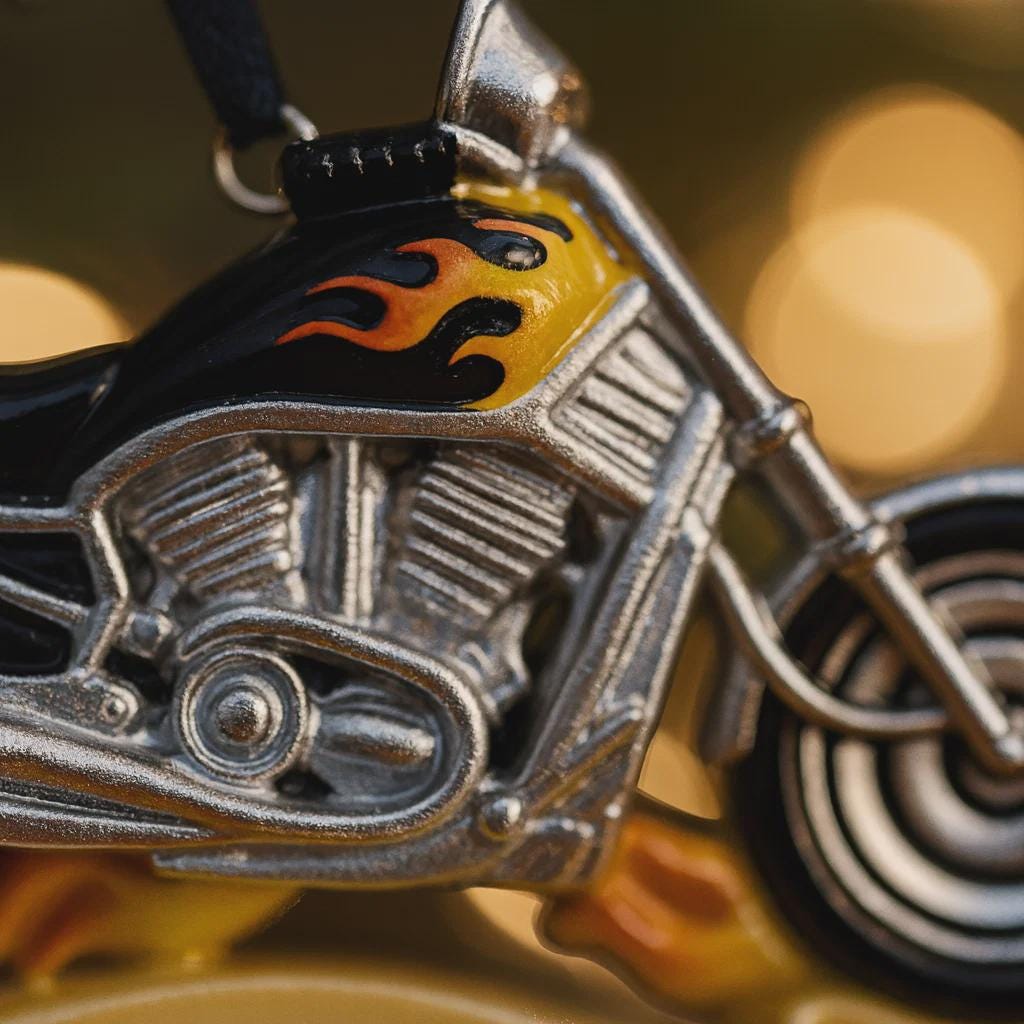 Metallic motorcycle model with flame design on a blurred background