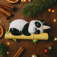 Load image into Gallery viewer, Fully 3D personalized unicorn panda Christmas ornament featuring a sleeping panda resting on a bamboo branch with a pastel unicorn horn. This ornament has a fully sculpted three dimensional front and back with no flat surfaces, creating a playful and premium look. Custom name and year are added by hand. Perfect for kids, panda lovers, unicorn fans, and whimsical holiday decor. A unique 3D keepsake for Christmas trees and seasonal displays.

