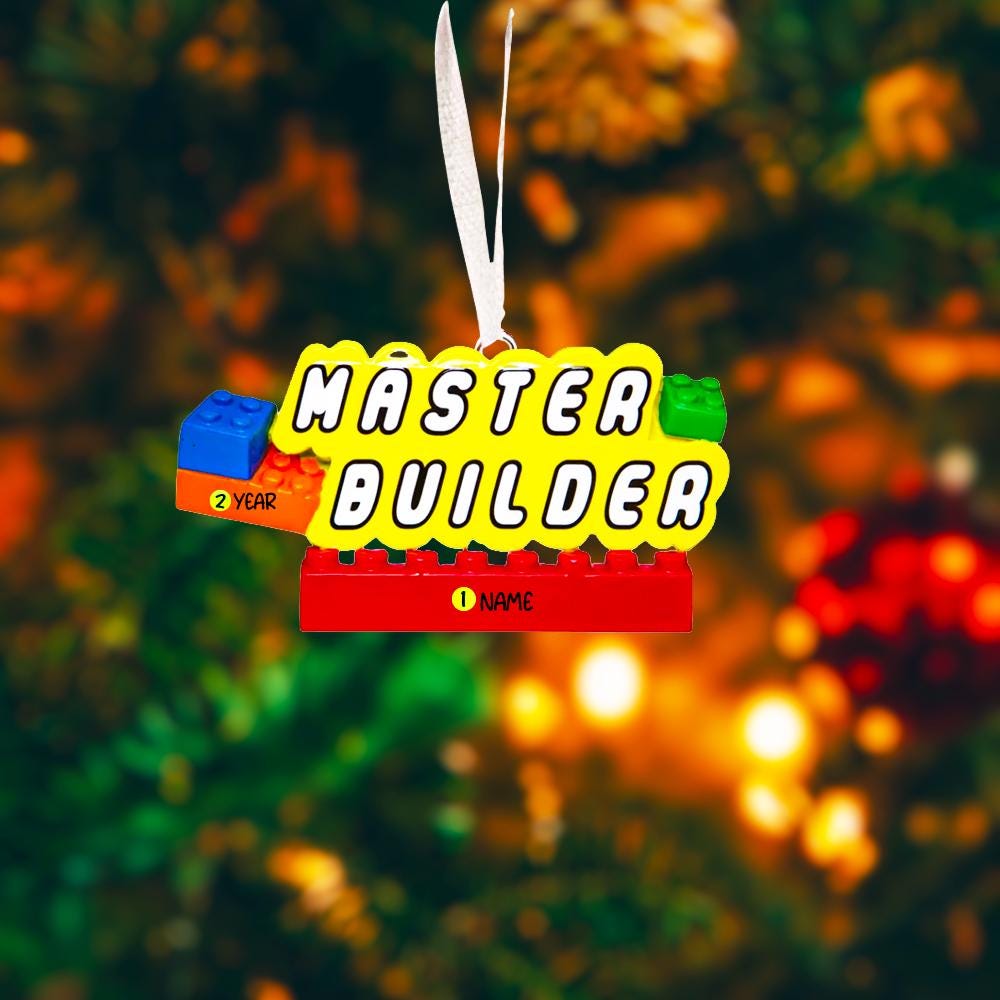 Personalized Master Builder Christmas ornament featuring a raised 3D front with colorful building block design and bold lettering. The ornament has a flat 2D back for easy hanging and durability. Bright primary colors and playful block details make it perfect for kids who love building toys. Personalization includes name and year, added by hand, making it a fun and meaningful holiday keepsake for children and young builders.