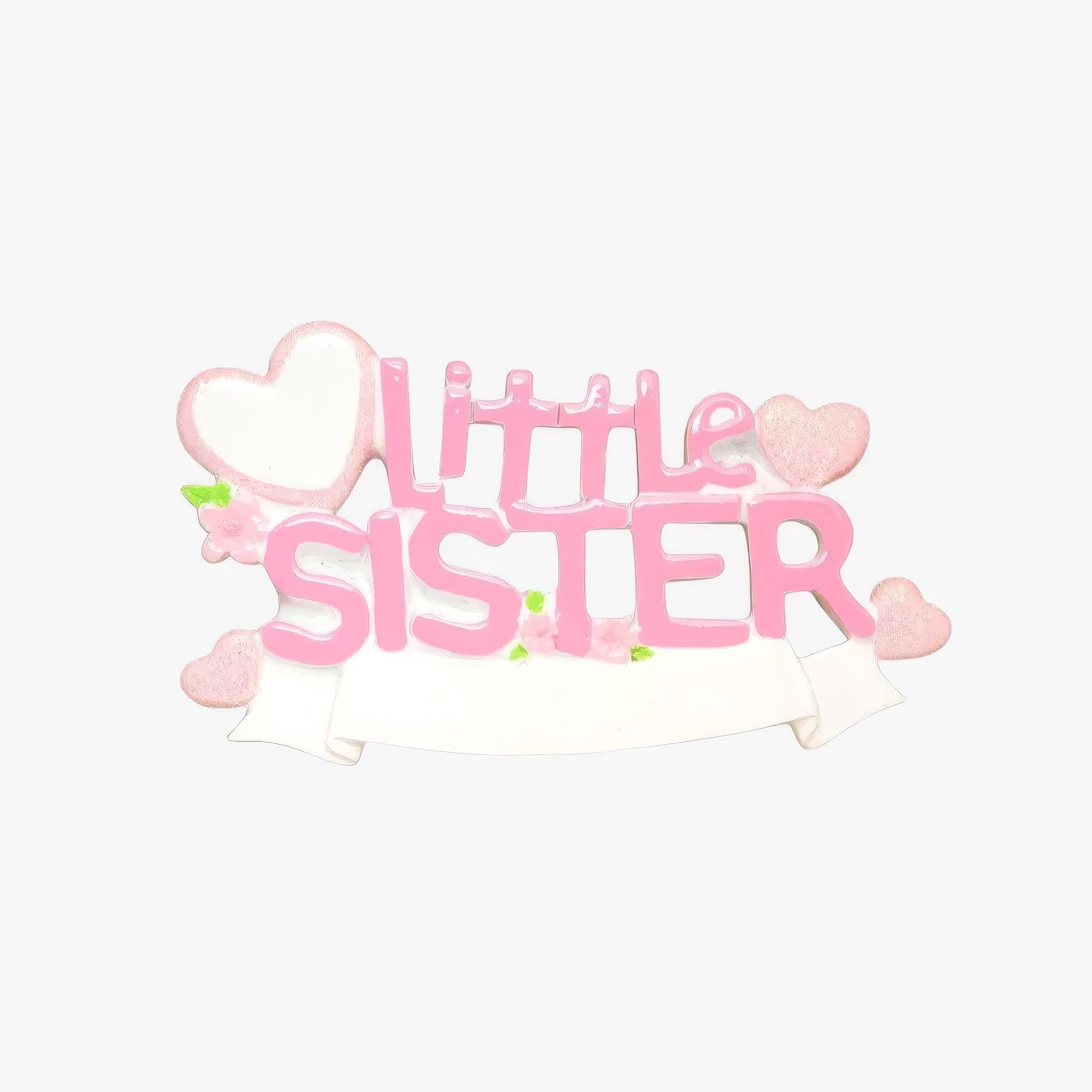 A personalized Little Sister ornament featuring soft pink layered lettering with heart accents and floral details. Designed in gentle pastel tones with a smooth resin finish and subtle glitter highlights. The ornament includes handwritten personalization with a baby name and year, created as a mostly 2D ornament with raised 3D details on the front only. Lightweight and easy to hang, perfect for celebrating a new baby sister and her first Christmas.