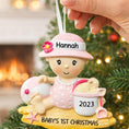 Load image into Gallery viewer, Personalized baby first Christmas ornament for baby girl featuring a beach and summer inspired design. This adorable keepsake includes handwritten name and year personalization, a soft pink baby figure, sand details and playful seaside elements. The ornament has a lightweight 2D base with raised 3D detailing on the front only. Perfect for baby’s first Christmas, nursery decor, coastal holiday themes and meaningful family gifts.

