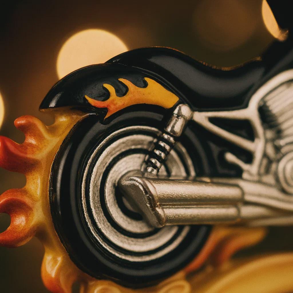 Close-up of a motorcycle model with flames on a blurred background