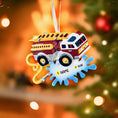 Load image into Gallery viewer, Colorful fire truck ornament with customizable text on a blurred Christmas tree background
