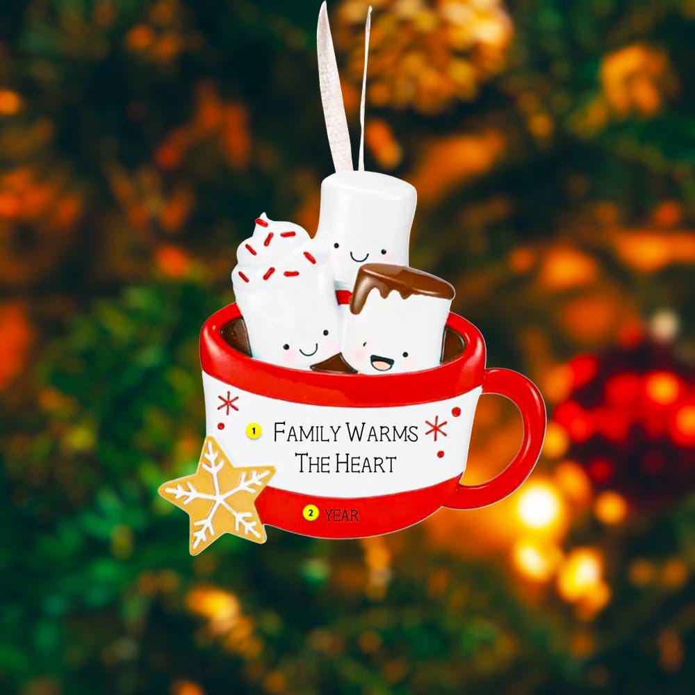 Decorative ornament with marshmallows in a mug on a festive background