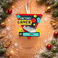 Load image into Gallery viewer, Personalized retro gamer Christmas ornament featuring a classic arcade style joystick and bold gaming icons. Raised 3D front details create depth while the back remains flat for easy hanging. Custom name and year placement make this ornament a fun and nostalgic keepsake for gamers and holiday tree decor.
