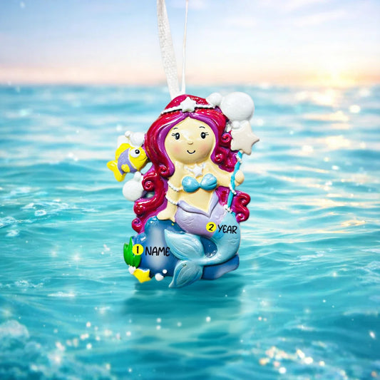 Mermaid ornament with customizable name and age on a blue water background