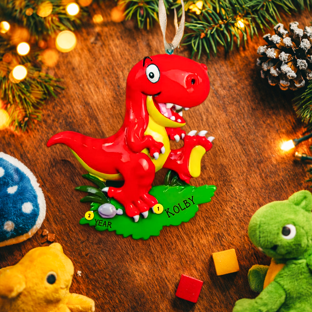 Colorful dinosaur themed Christmas ornament designed for kids, featuring a playful character and bright cheerful tones. Set in a cozy holiday scene, this ornament brings fun and imagination to children’s Christmas tree decor. Designed to be personalized, making it a special keepsake for kids who love dinosaurs and playful holiday decorations.

