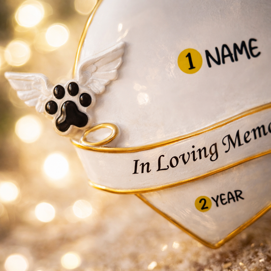 Heart shaped pet memorial Christmas ornament designed to honor the loving memory of a beloved pet. Features angel wing paw details and a soft elegant design that brings comfort and warmth during the holiday season. Includes a customizable name and year area, allowing you to create a meaningful keepsake in remembrance of a cherished companion. Perfect for memorial Christmas trees sympathy gifts pet loss remembrance and heartfelt holiday decor.