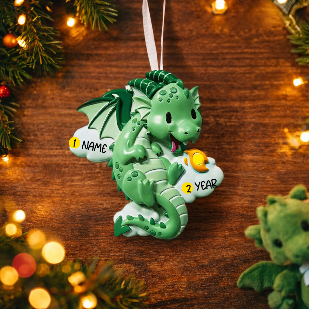 green dragon ornament designed with a fully sculpted 3D front that showcases raised details and expressive features, paired with a smooth 2D flat back for lightweight hanging. The glossy finish enhances the depth of the front design while keeping the back clean and minimal. Personalized name and year placement are clearly visible, making this dragon ornament a magical keepsake and a charming addition to holiday decor or fantasy themed collections.