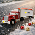 Load image into Gallery viewer, Red semi truck ornament featuring a classic delivery truck design with a glossy red cab and white trailer. The ornament includes free handwritten personalization with a name and year, making it a meaningful keepsake for truck drivers, transportation families, and kids who love big trucks. Clean front facing design with smooth resin finish, perfect for Christmas tree decor and holiday displays.

