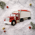 Load image into Gallery viewer, Red semi truck ornament featuring a classic delivery truck design with a glossy red cab and white trailer. The ornament includes free handwritten personalization with a name and year, making it a meaningful keepsake for truck drivers, transportation families, and kids who love big trucks. Clean front facing design with smooth resin finish, perfect for Christmas tree decor and holiday displays.


