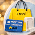 Load image into Gallery viewer, A modern money themed ornament featuring a shopping bag, a credit card detail, and a receipt element, designed to represent budgeting, spending habits, and financial milestones in a fun and playful way. The ornament showcases a raised 3D front with clean sculpted details and a glossy finish, combined with a flat 2D back for smooth and balanced hanging. Made from durable resin and presented as a clean cutout style visual, this ornament is a perfect gift choice for finance lovers, shoppers, accountants, entre
