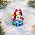Load image into Gallery viewer, Mermaid ornament with customizable name and age on a snowy background
