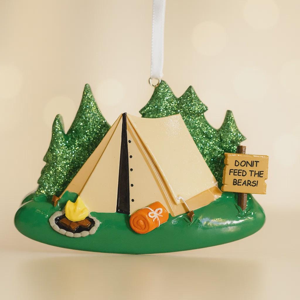 Camping-themed ornament with a tent, trees, and a 'Don't Feed the Bears!' sign on a beige background.