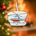 Load image into Gallery viewer, Decorative helicopter ornament with customizable text on a blurred Christmas tree background
