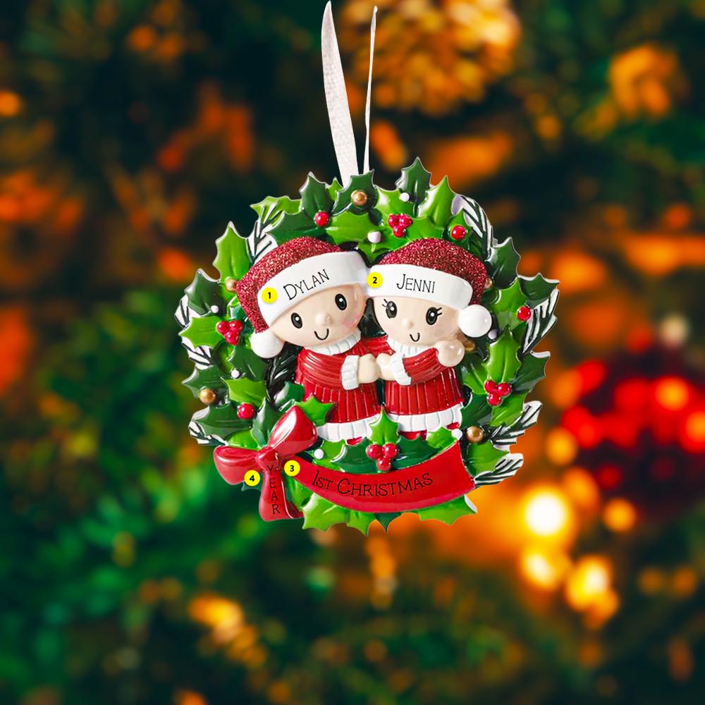 Christmas ornament with couple in a wreath against a blurred festive background