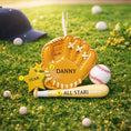 Load image into Gallery viewer, Personalized baseball glove Christmas ornament featuring a tan baseball glove with stitched details, customizable name area on the glove, customizable year star, and customizable text on the baseball bat, glossy finish with raised 3D front details and flat 2D back, white satin hanging ribbon, displayed on a snowy baseball field themed holiday background with baseballs and pine branches.
