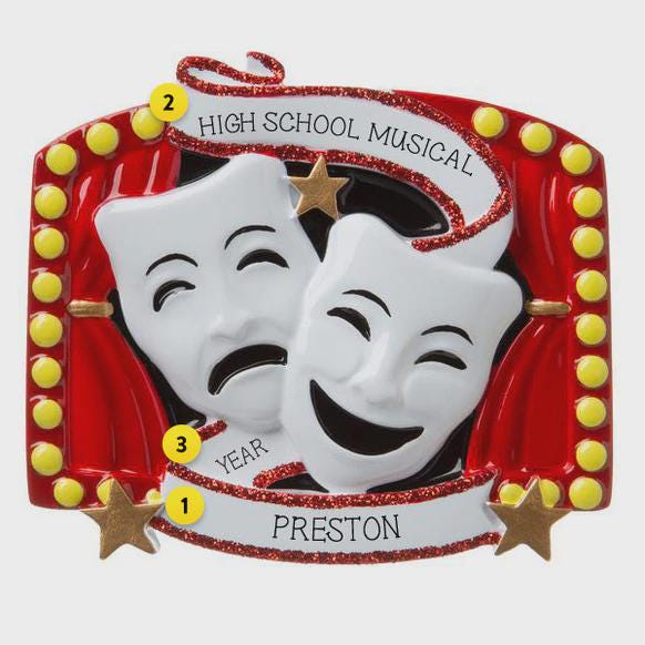 Decorative plaque with theater masks and 'High School Musical' text on a white background