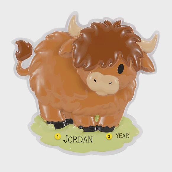 Adorable Highland cow themed Christmas ornament featuring a fluffy brown cow design with soft rounded details and a warm countryside feel. Styled in a natural green meadow setting, this ornament is designed to be personalized and brings a cozy farm inspired charm to holiday tree decor.
