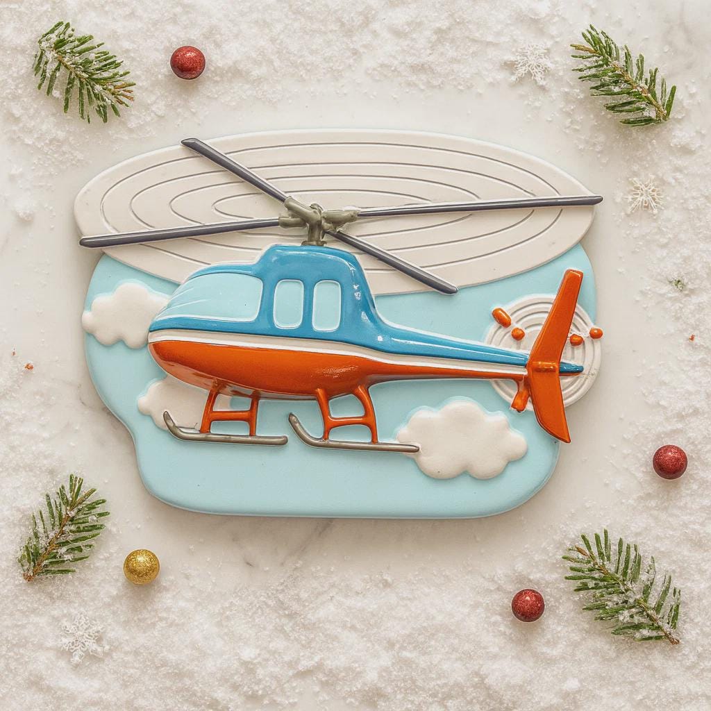Decorative cookie shaped like a helicopter on a snowy background with pine branches and berries.