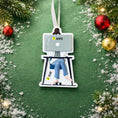 Load image into Gallery viewer, Decorative ornament with a person on a laptop, surrounded by Christmas decorations.
