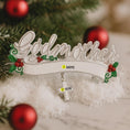 Load image into Gallery viewer, Decorative ornament with 'Godmother' text and a cross charm on a Christmas tree background.
