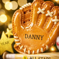 Load image into Gallery viewer, Personalized baseball glove Christmas ornament featuring a tan baseball glove with stitched details, customizable name area on the glove, customizable year star, and customizable text on the baseball bat, glossy finish with raised 3D front details and flat 2D back, white satin hanging ribbon, displayed on a snowy baseball field themed holiday background with baseballs and pine branches.

