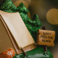 Load image into Gallery viewer, Toy bear in a camping scene with a 'Don't Feed the Bears!' sign
