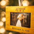 Load image into Gallery viewer, Personalized just married photo frame ornament featuring a rustic yellow frame design. A romantic keepsake for newlyweds couples celebrating their first Christmas married or Valentine’s Day. Perfect wedding gift engagement decor and meaningful holiday ornament.
