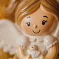 Load image into Gallery viewer, Close-up of a decorative angel figurine with a small bird.
