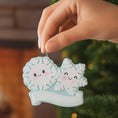 Load image into Gallery viewer, Personalized snowflake couple ornament featuring two smiling snowflakes, customized with two names and a year or family name. A perfect Christmas keepsake for couples, partners, siblings, or loved ones celebrating winter memories together. This festive ornament adds a playful and heartfelt touch to holiday decor, making it a meaningful gift for Christmas, anniversaries, or winter celebrations.

