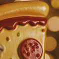 Load image into Gallery viewer, Close-up of a toy pizza with cheese and tomato sauce on a blurred background

