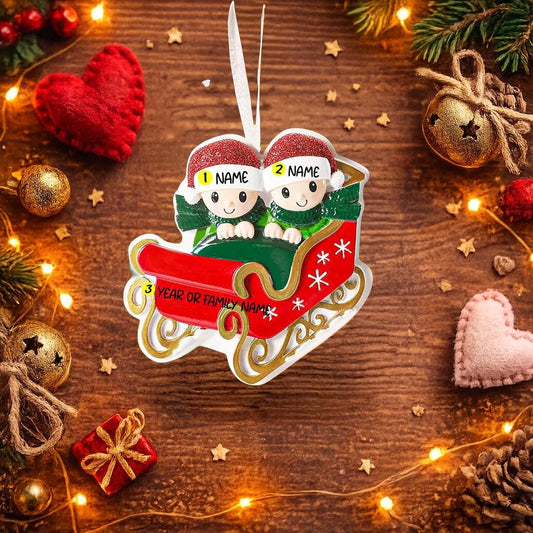 Personalized couple ornament featuring two characters sitting together in a festive sleigh design. This romantic Christmas ornament can be customized with two names and a year or family name, making it perfect for couples, partners, spouses, fiancés, or loved ones. Ideal for celebrating love, togetherness, Valentine’s Day, anniversaries, or first holidays together. A meaningful keepsake for couples who want to turn shared moments into lasting holiday memories.
