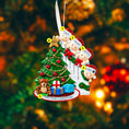 Load image into Gallery viewer, Personalized family Christmas ornament with four children around a Christmas tree on a blurred festive background.
